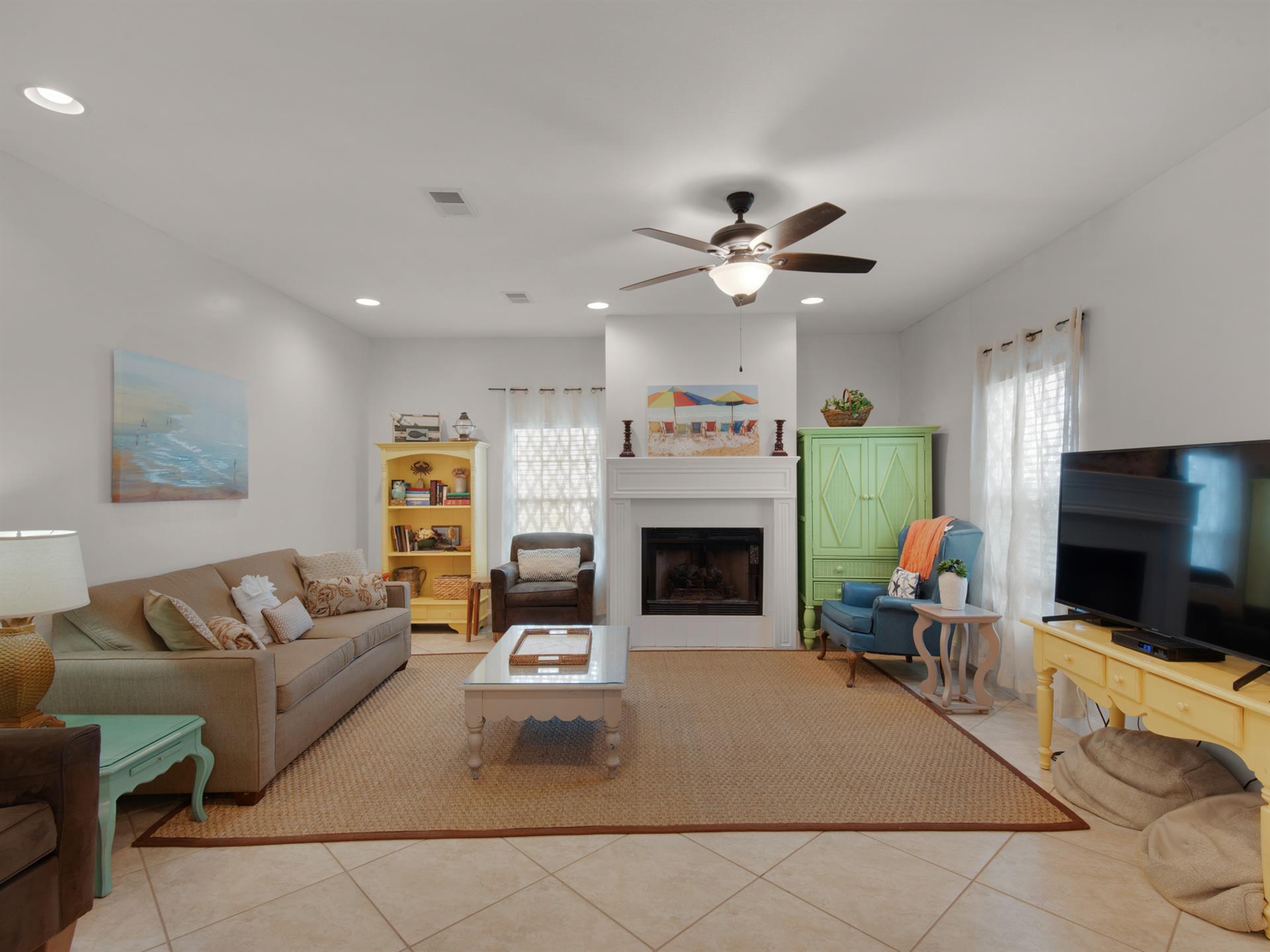 Living area with a Cozy Sleeper deluxe with 8.5 sleeper mattress fireplace inoperable