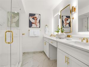Stunning Primary Bathroom with Gold Finishes