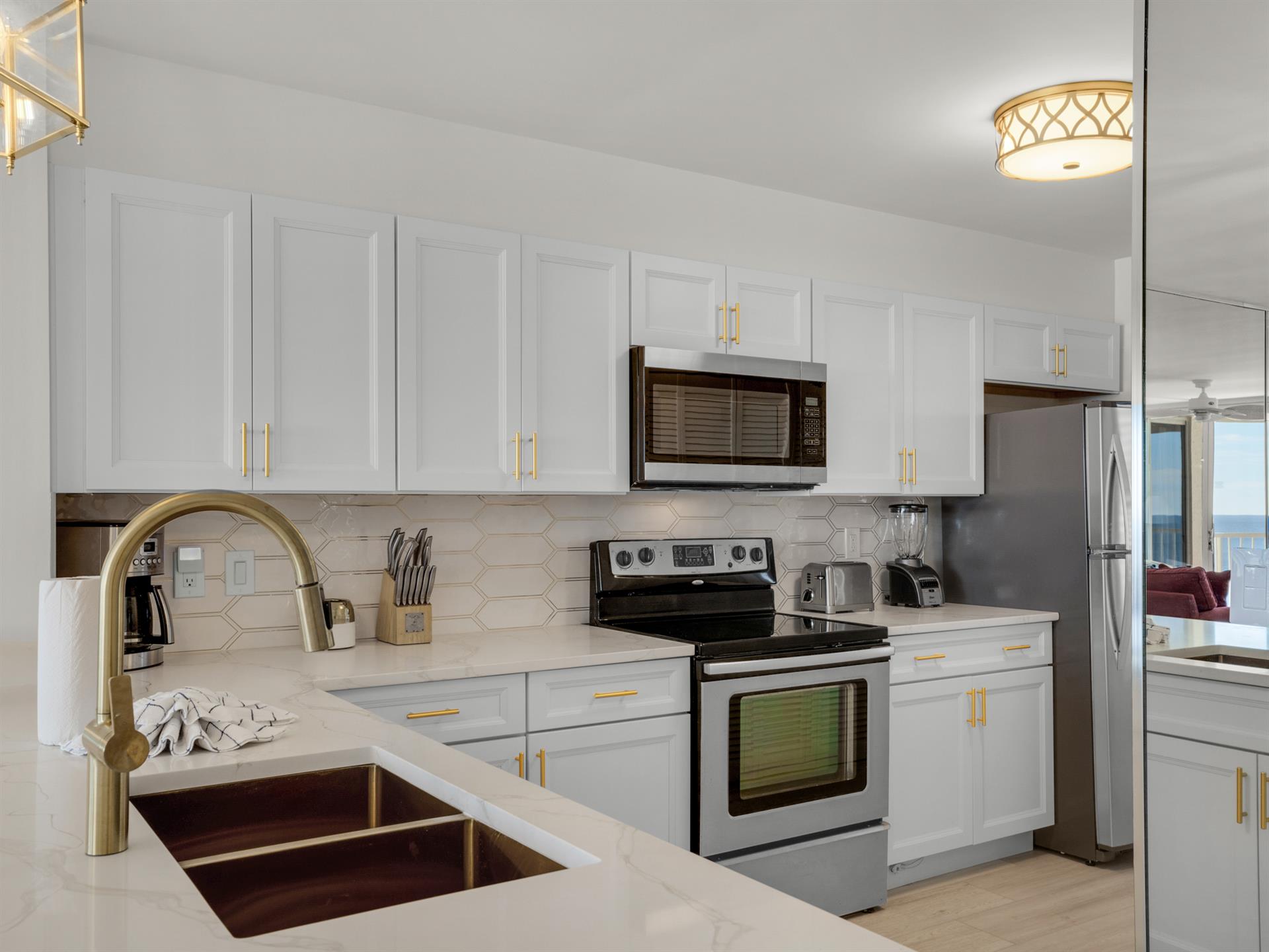 Spacious Kitchen with Lovely Gold Accents