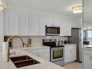 Spacious Kitchen with Lovely Gold Accents