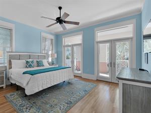 Primary bedroom with front porch access  1st floor