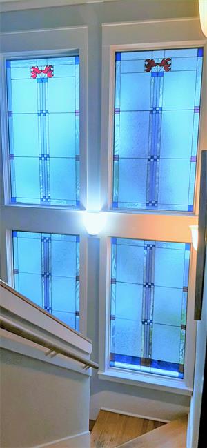 Beautiful stained glass at stairwell landing