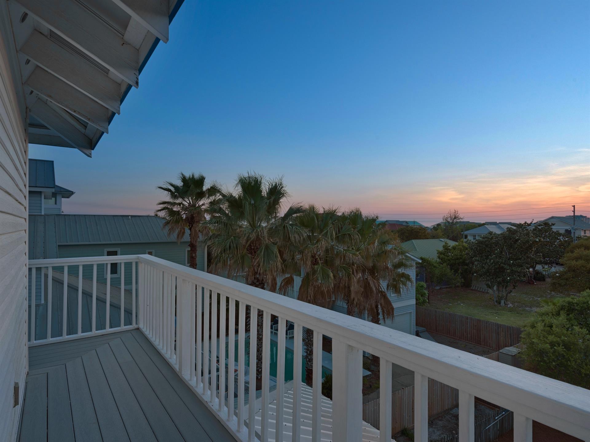 Balcony View of Coastal Sunsets