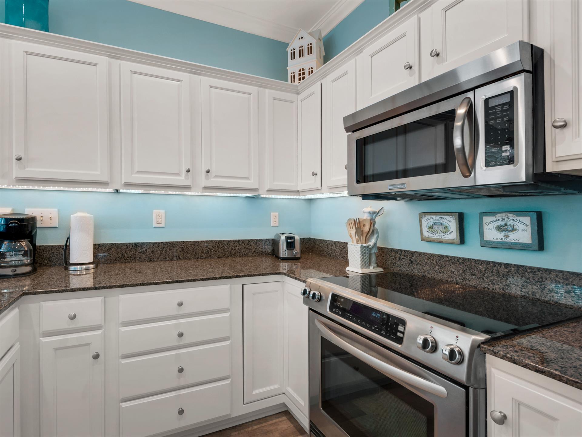 Plenty of Counter Space, Unique Lighting and Stainless Appliances