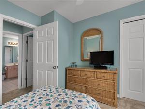 Twin Room with Flat Screen TV and Hallway Access to Guest Bath