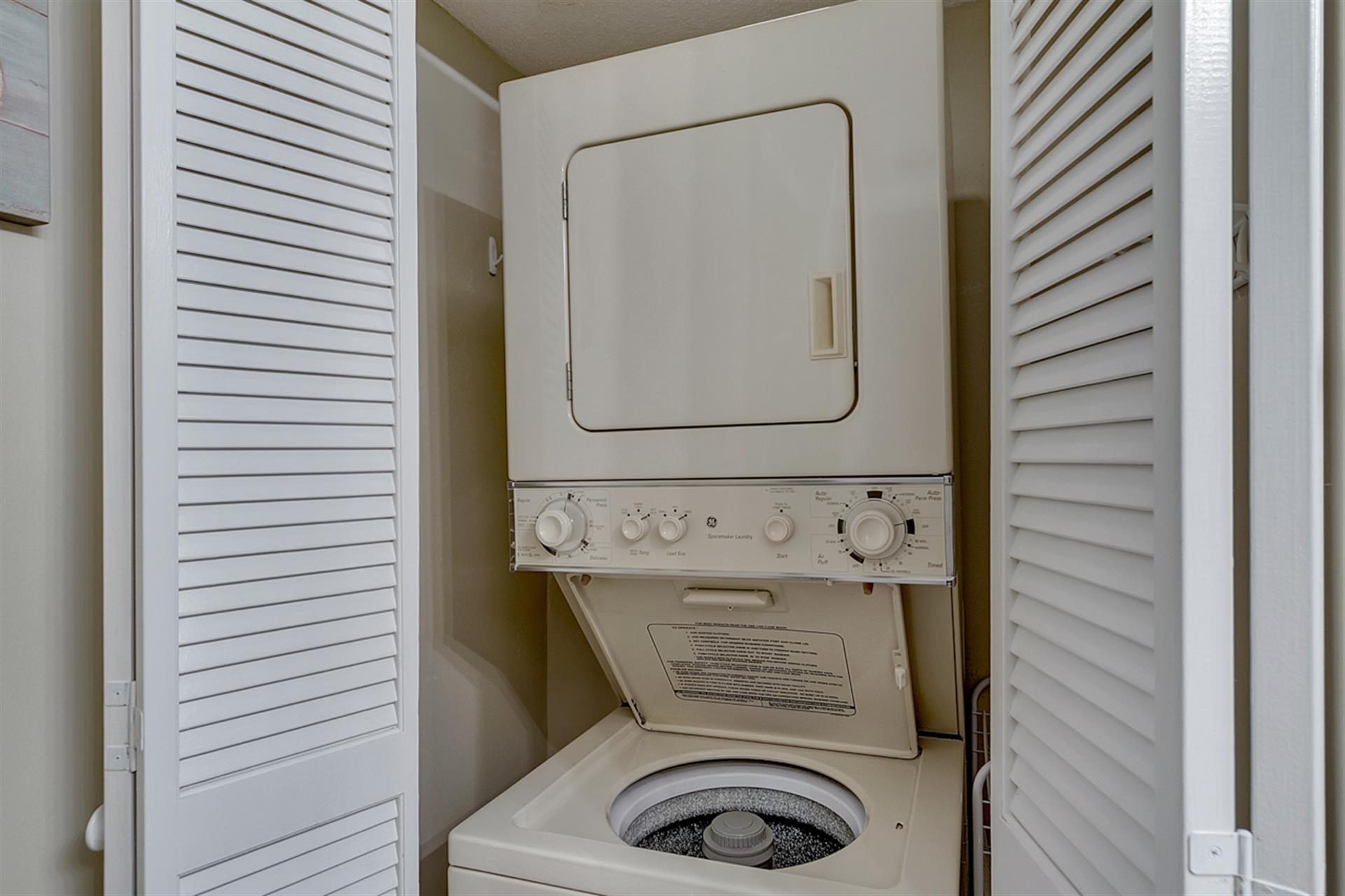 Stackable Washer and Dryer in Hall Bathroom