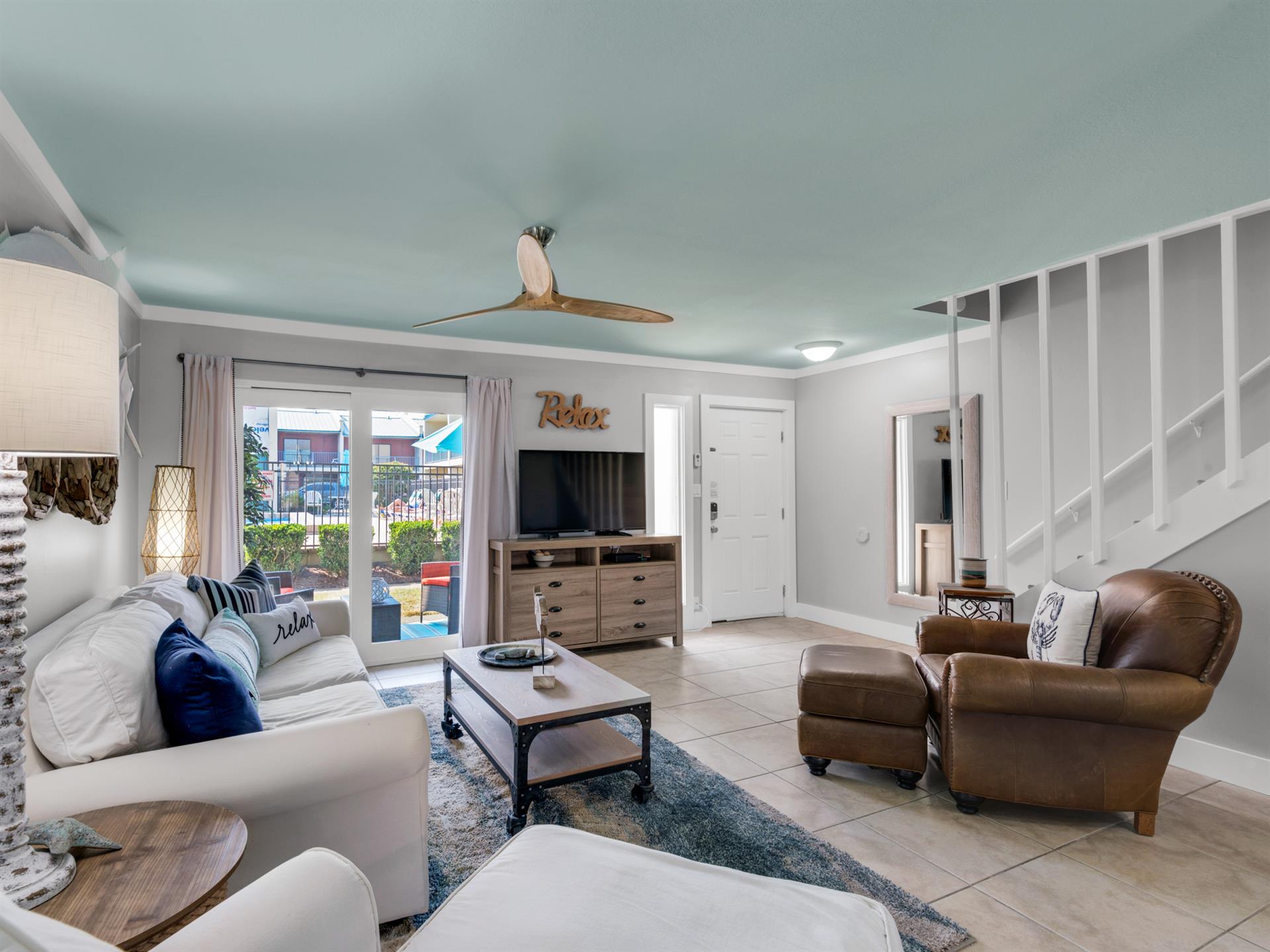 Living Area on 1st Floor with Private Patio