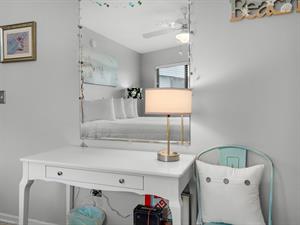 Guest Bedroom with Desk and TV