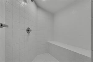 Walk in Shower with Bench in Primary Bathroom