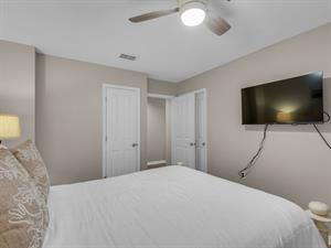 Guest Bedroom with Queen Bed and Flat Screen TV