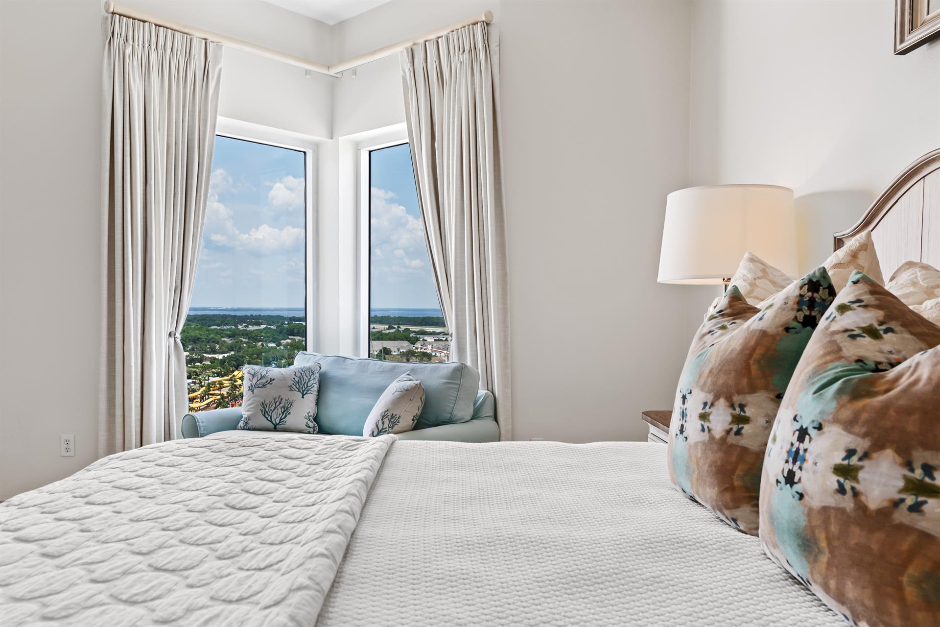 Guest Bedroom 1 with King Bed and Full Sized Pull Out Sleeper Chair