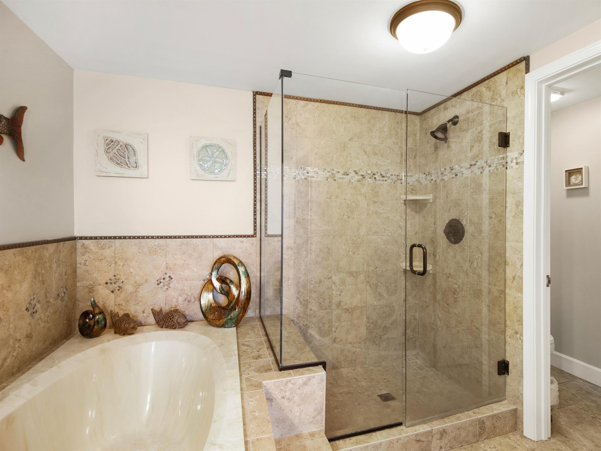 Primary Bathroom with WalkIn Shower and Soaking Tub