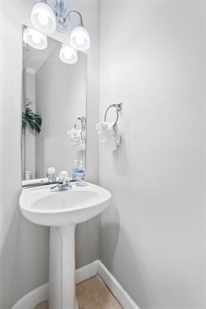 Half Bathroom off Kitchen and Dining Area