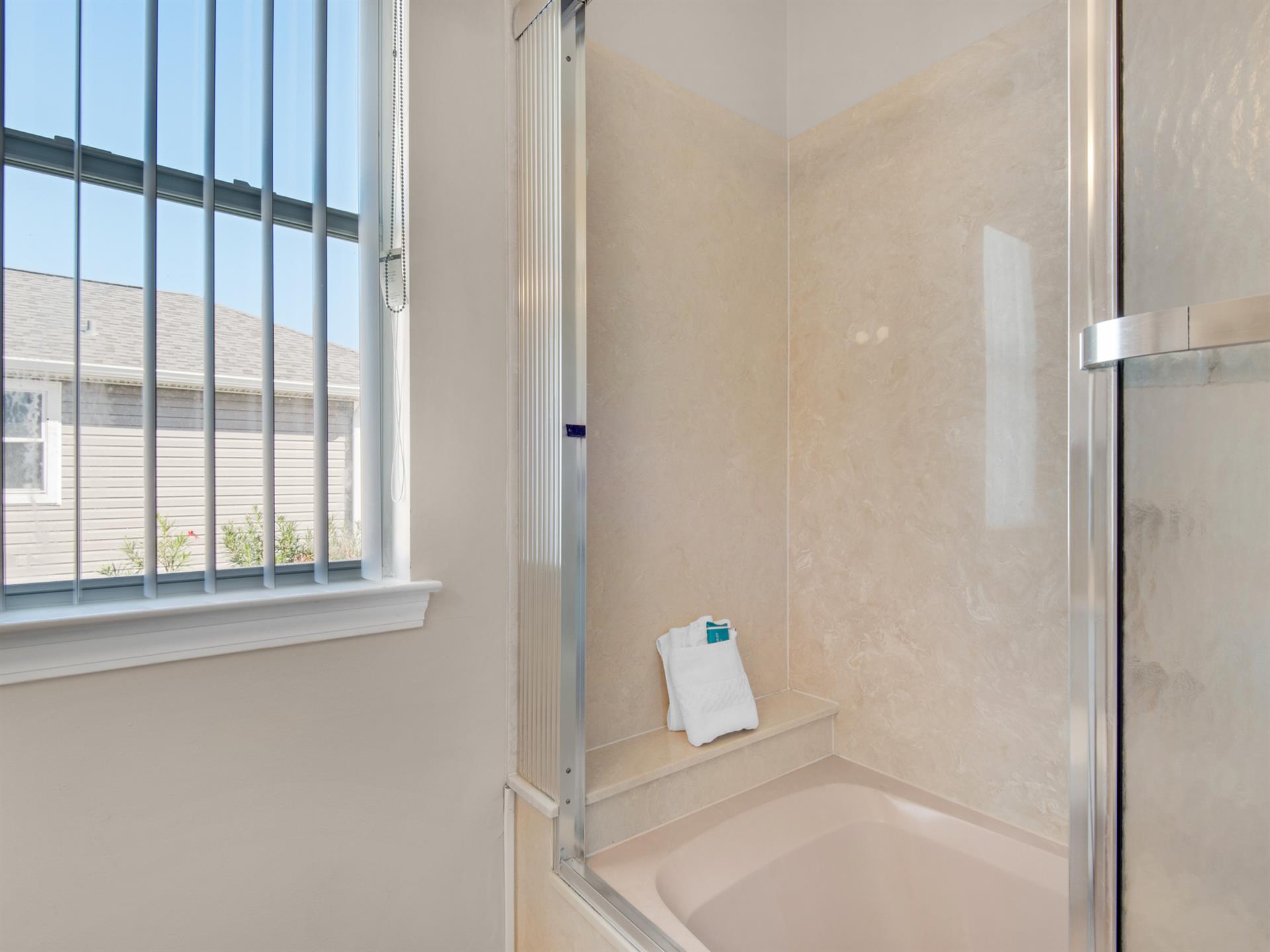 2nd floor guest bathroom with tub shower combo