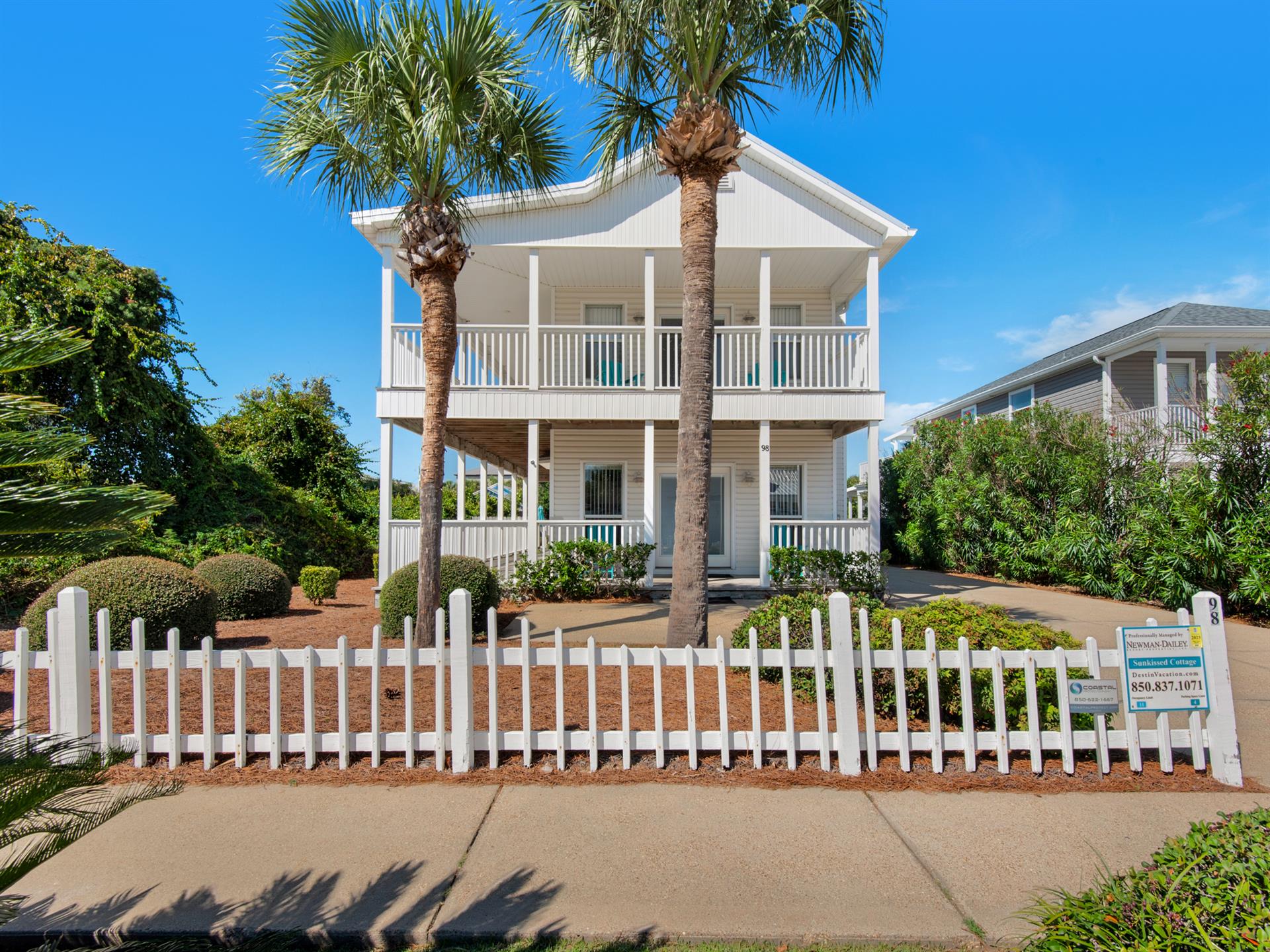 Sunkissed Cottage with white picket fence