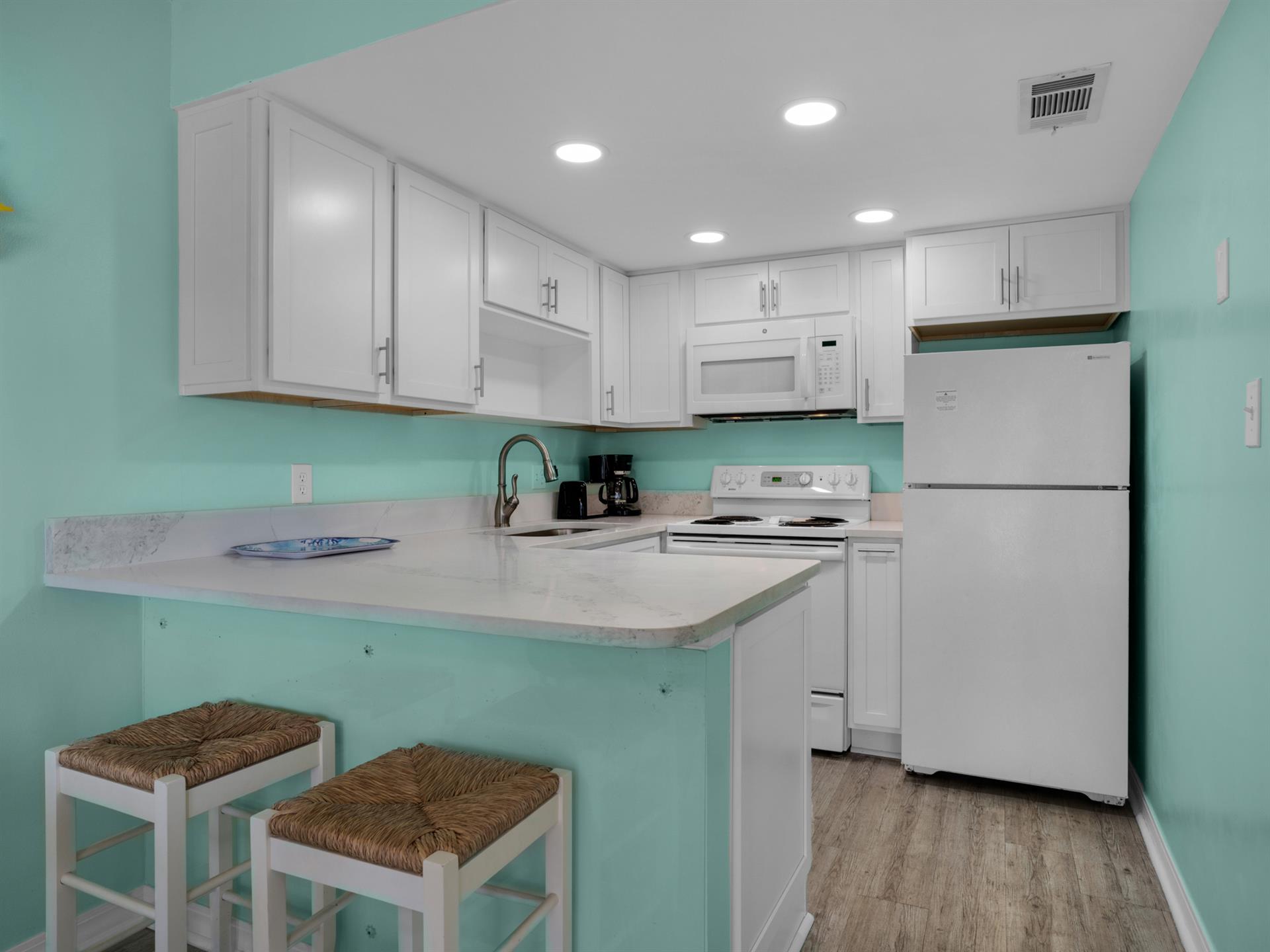 Kitchen with additional breakfast bar seating