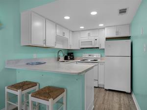 Kitchen with additional breakfast bar seating