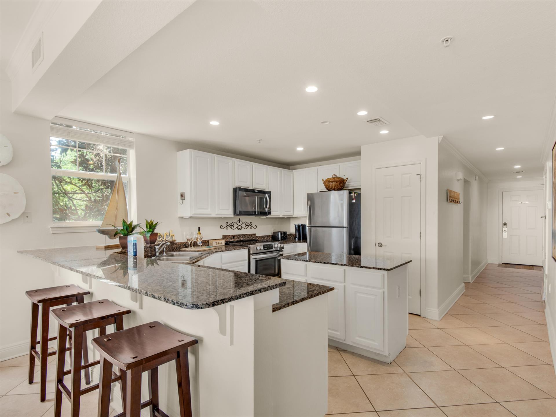 Kitchen with additional breakfast bar seating