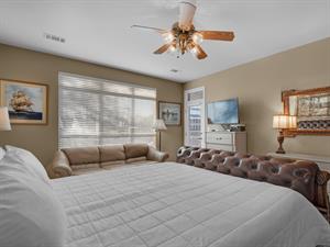 Flat Screen TV and Private Entrance to Porch from Primary Bedroom