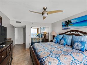 Primary Bedroom with King Bed and Flat Screen TV