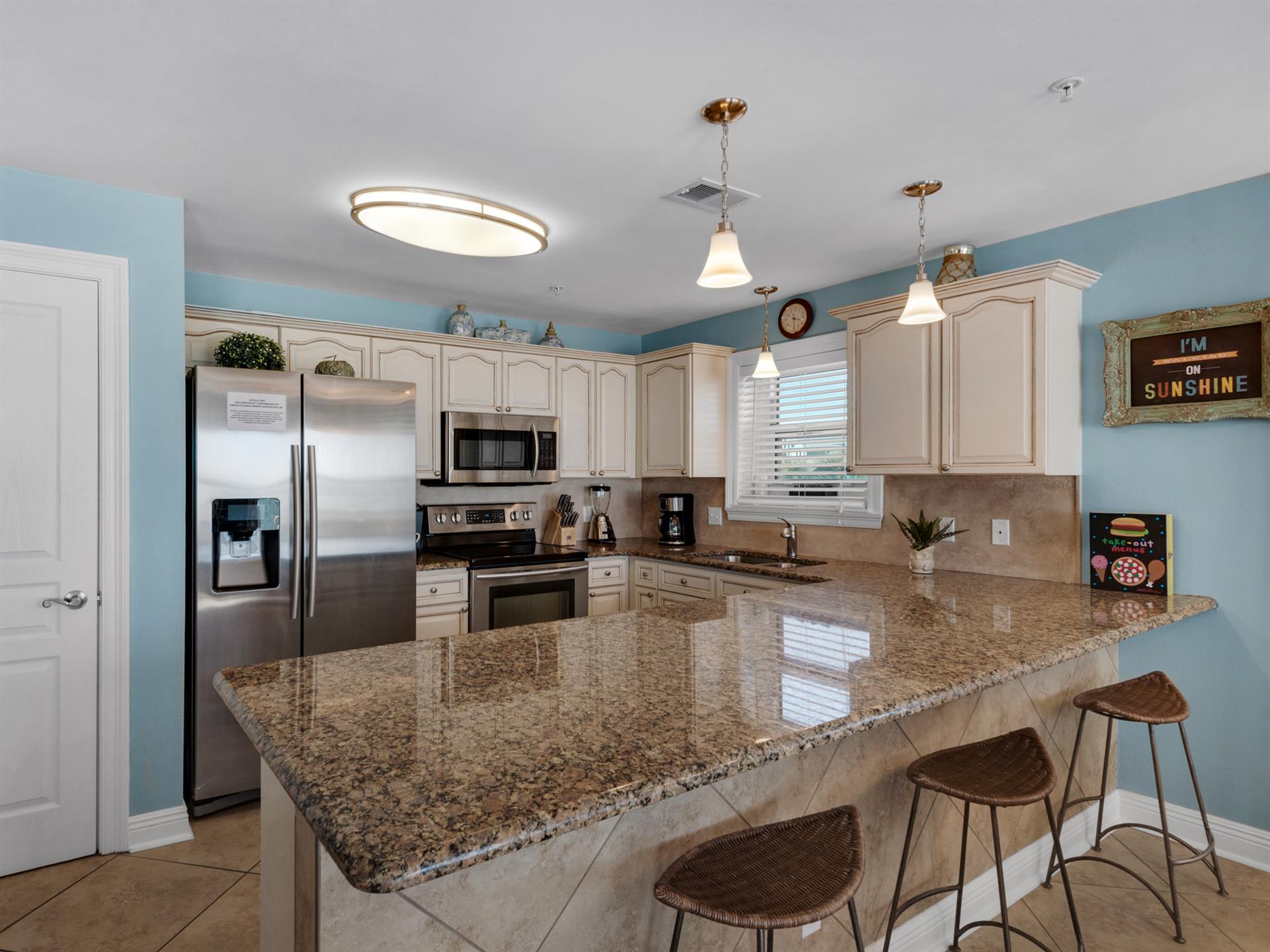 Kitchen with Stainless Appliances and Bar Seating