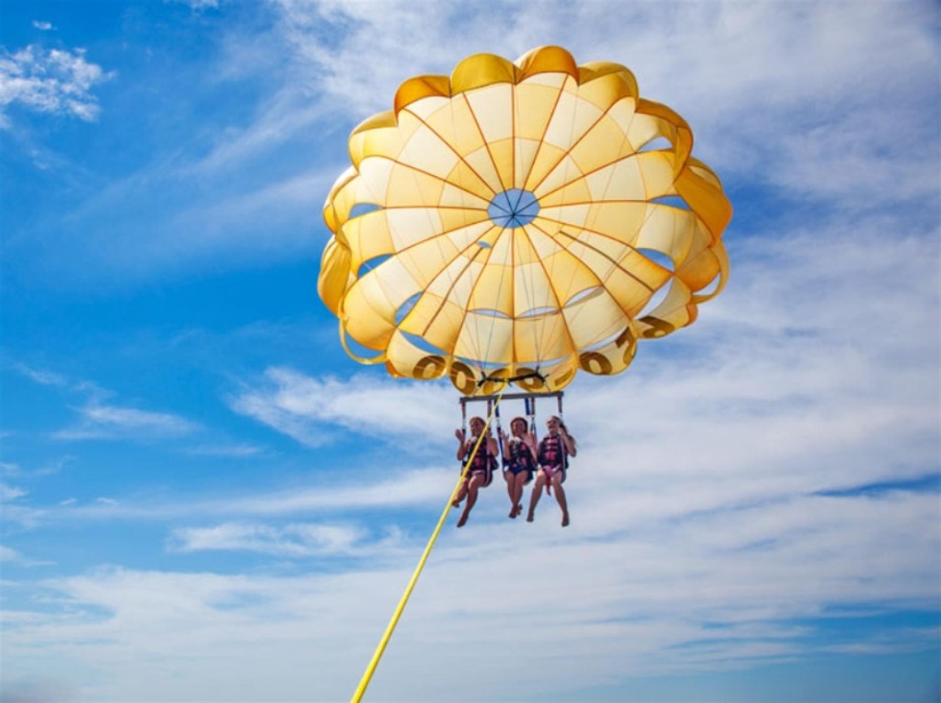 Free Adult Admission on a Parasailing Excursion in Season